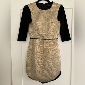 Black Halo sweater dress.